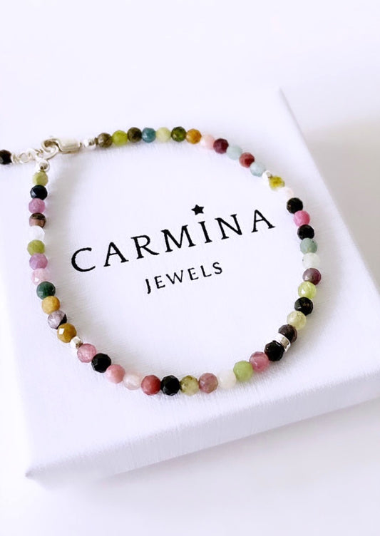 A multicolored mixed quartz crystal bracelet with a gold filled or sterling silver lobster clasp
