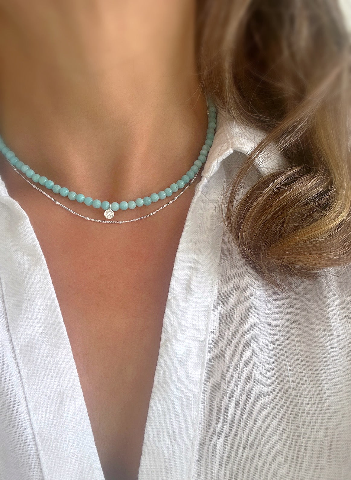 Turquoise amazonite beaded necklace With a silver charm