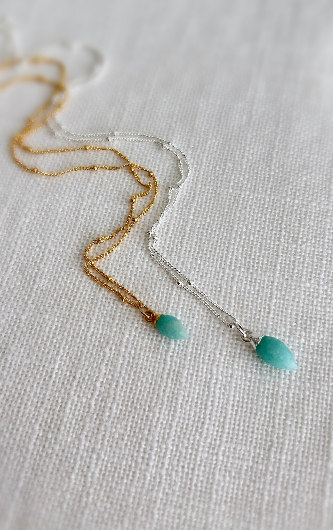 A beautiful sparkly Sterling Silver satellite chain necklace with a semi precious Amazonite marquise droplet charm ~ finished in a Sterling Silver setting.