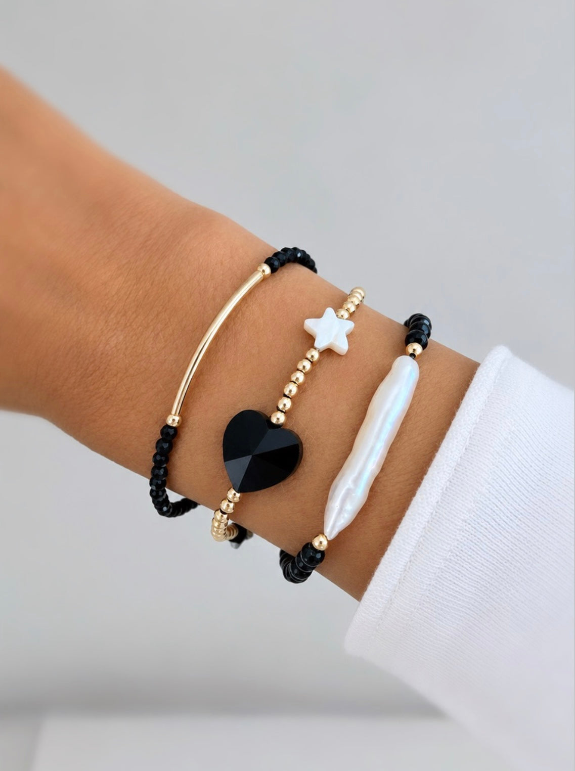 Beautiful Black Spinel semi precious faceted bead bracelet hand threaded on a strong stretch elastic cord. This delicate bracelet comes in a choice of two finishes using either Sterling Silver or Gold Filled accents.
