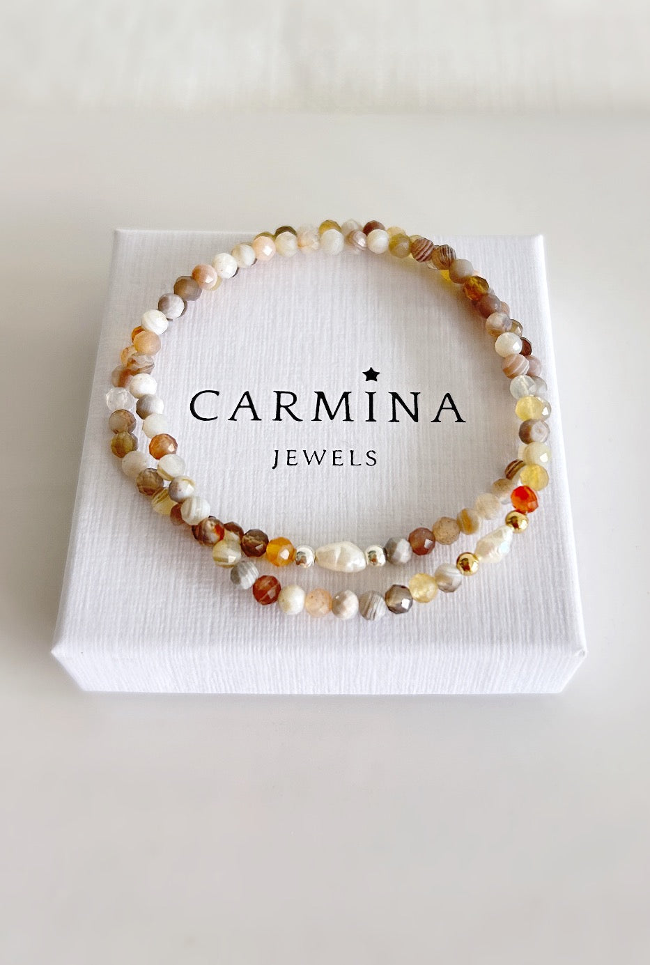 Botswana agate crystal beaded bracelet with a rice pearl on a stretch cord 