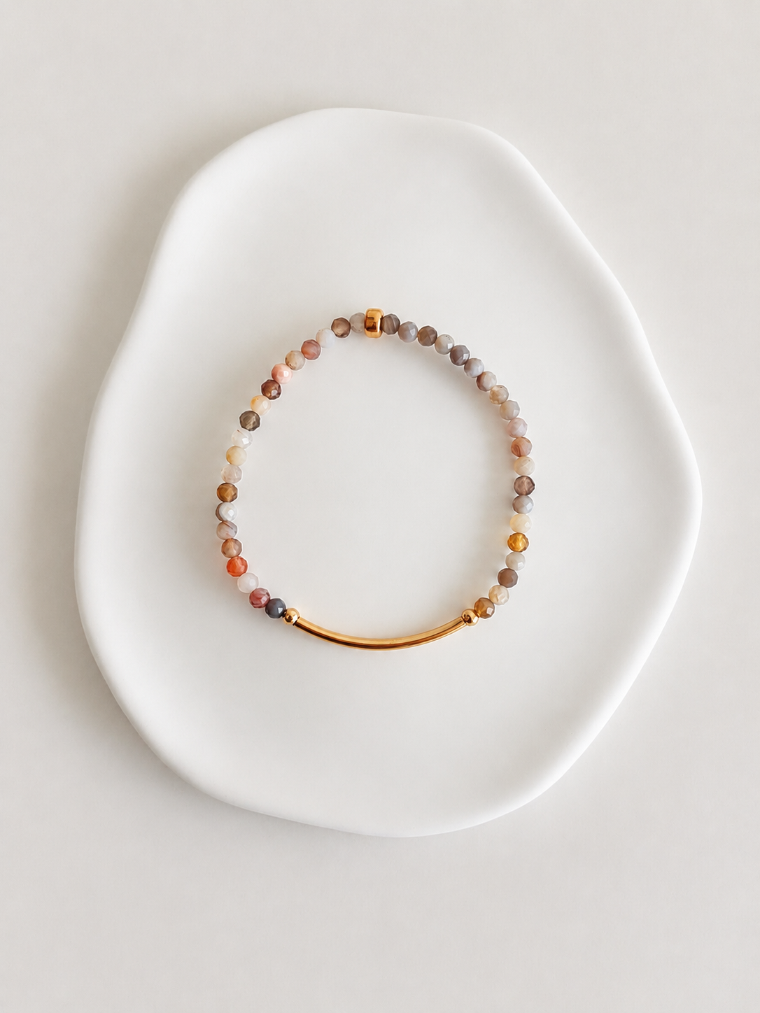 Beautiful Botswana Agate semi precious faceted bead bracelet. This delicate bracelet comes in a choice of two finishes using either Sterling Silver or Gold Filled accents.