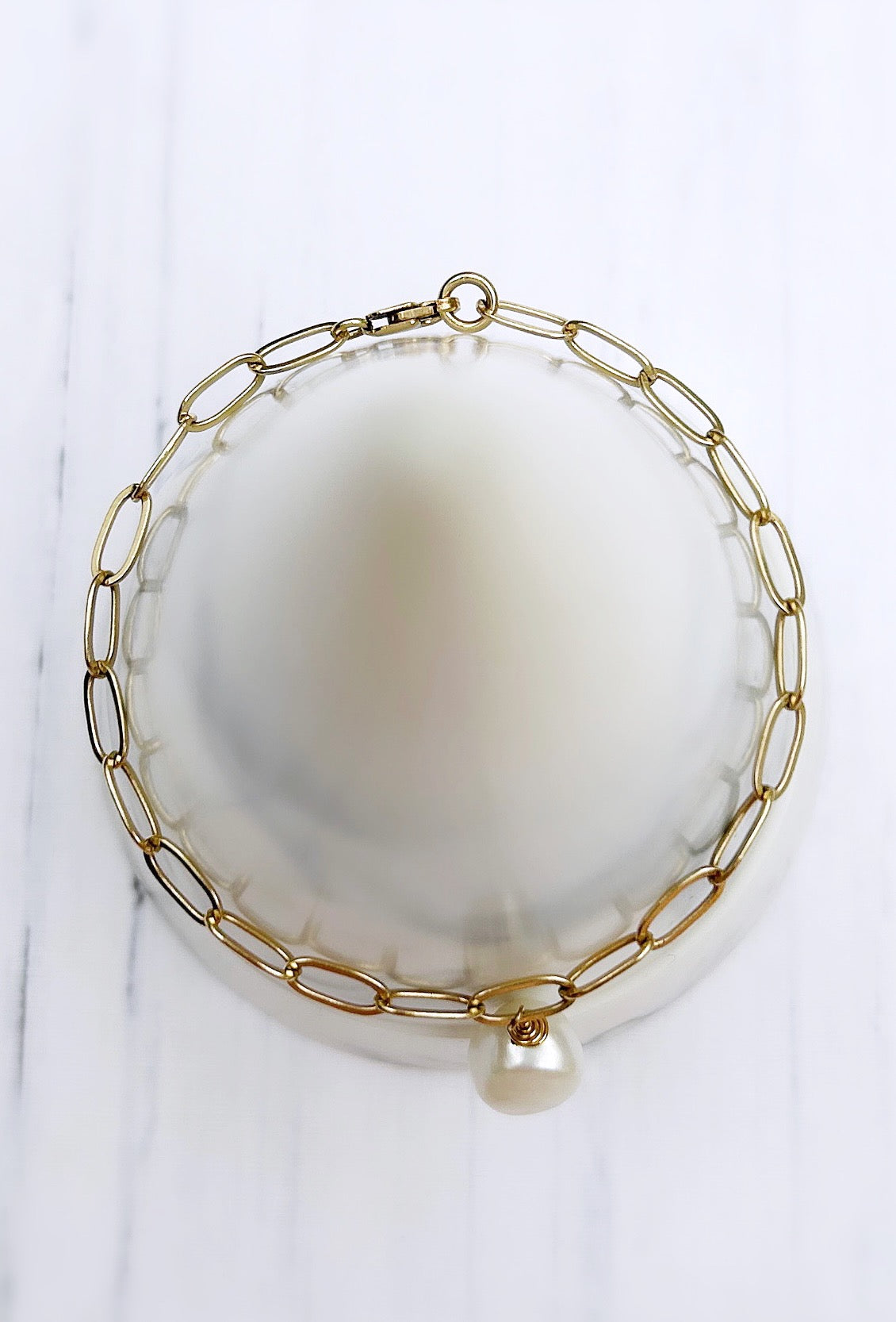 A beautiful large link paperclip/cable chain bracelet with a large baroque Freshwater Pearl