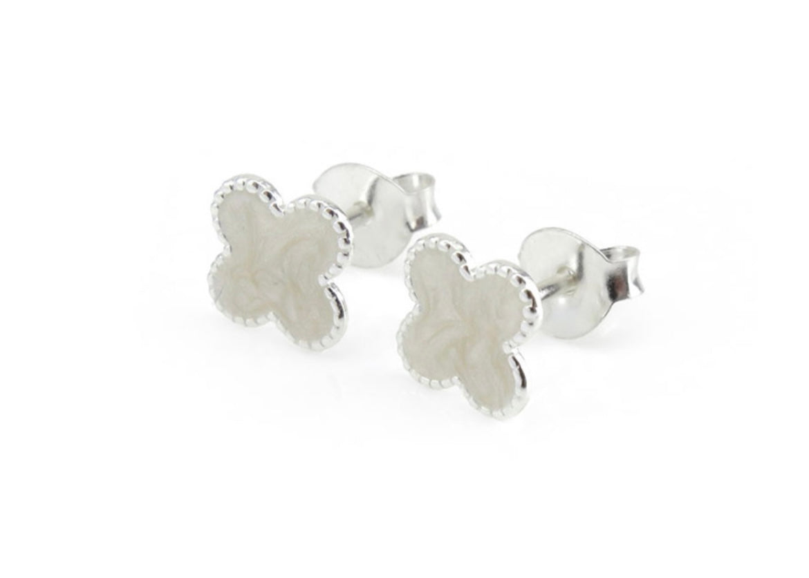 Beautiful clover design earrings in a delicate scalloped edge Sterling Silver finish with an off white enamel centre. 