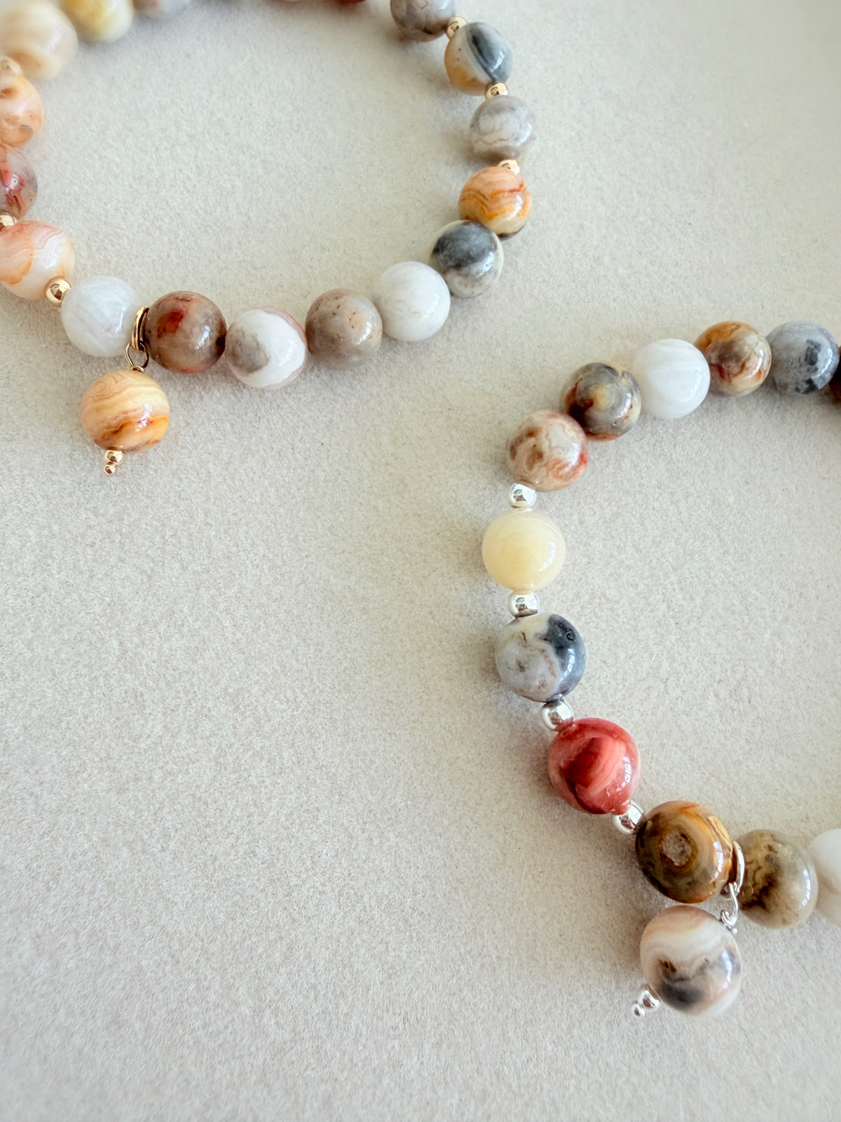 A beautiful grey/beige Crazy lace Agate beaded bracelet accented with Miyuki seed beads in your choice of Gold Filled or Sterling Silver. The 8mm beads are the perfect size to complement your stacks of smaller bracelets and bangles.
