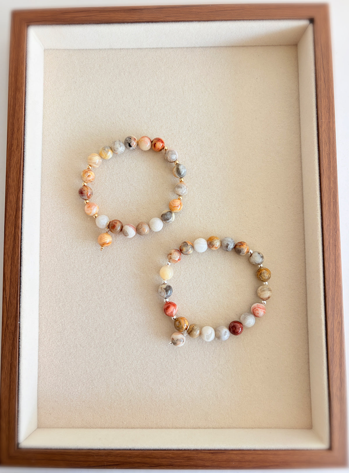 A beautiful grey/beige Crazy lace Agate beaded bracelet accented with Miyuki seed beads in your choice of Gold Filled or Sterling Silver. The 8mm beads are the perfect size to complement your stacks of smaller bracelets and bangles.
