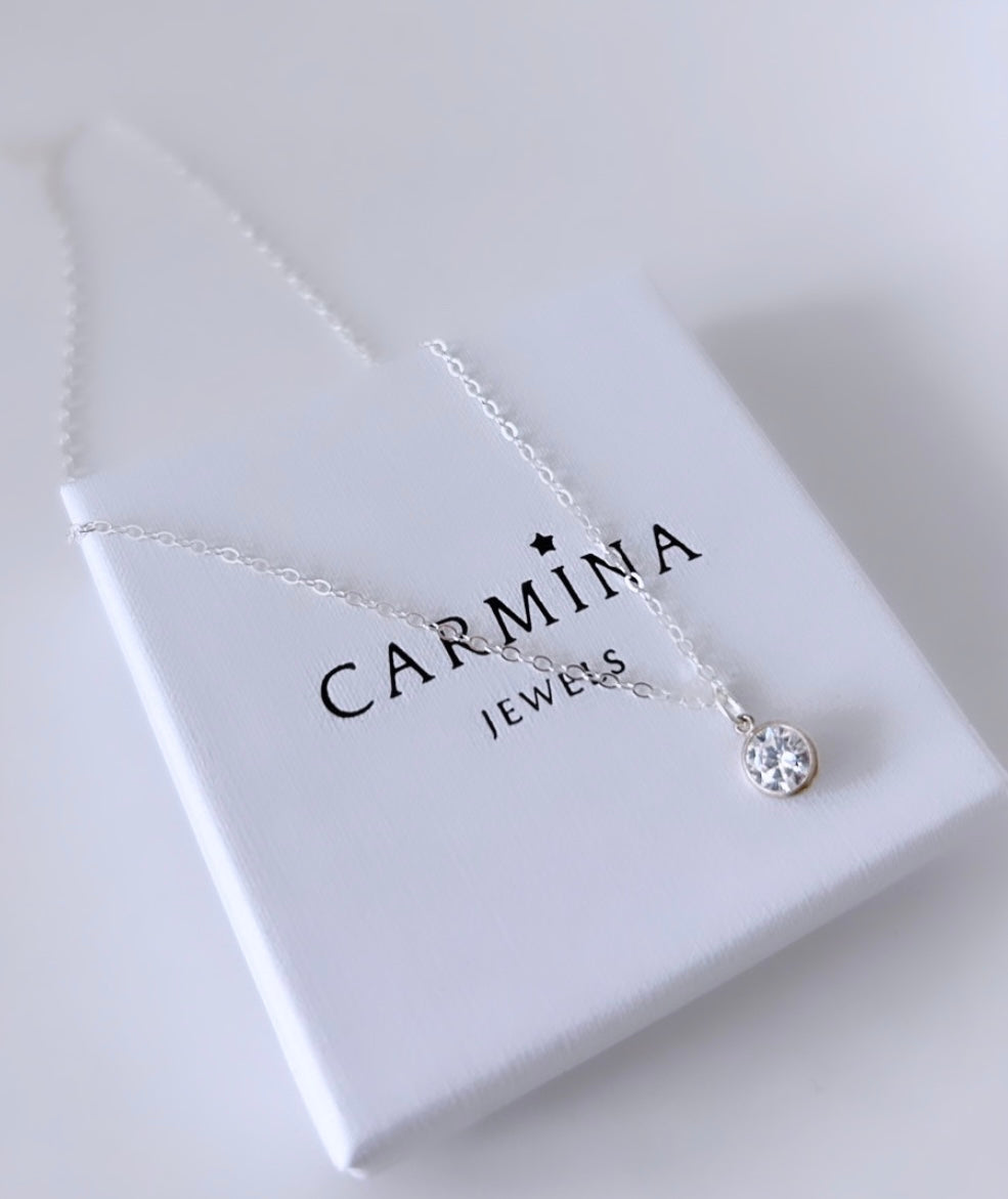 A beautiful crystal gemstone necklace - a gorgeous sparkly Cubic Zirconia charm on a delicate cable chain. 