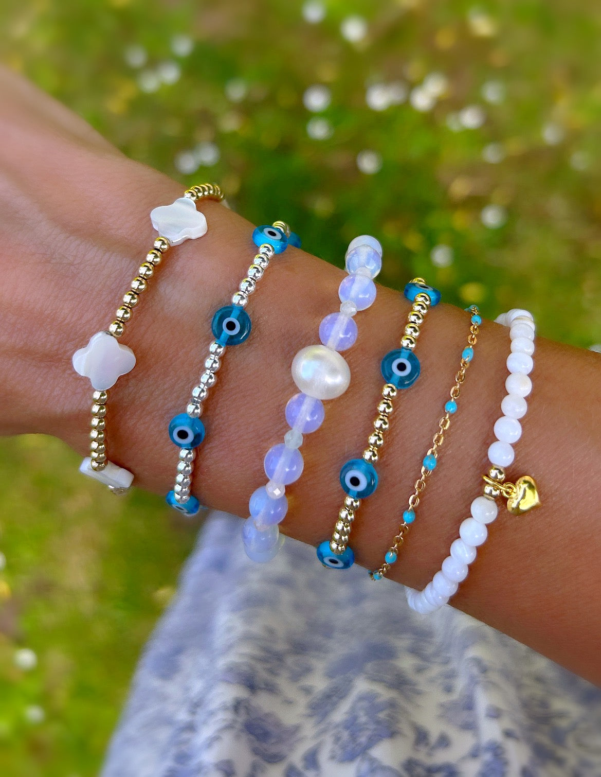 Pretty handmade Murano glass lucky ‘evil’ eye charm bracelet in a Sterling Silver or Gold Filled finish. Choose from either blue or turquoise glass ‘eye’ beads. 