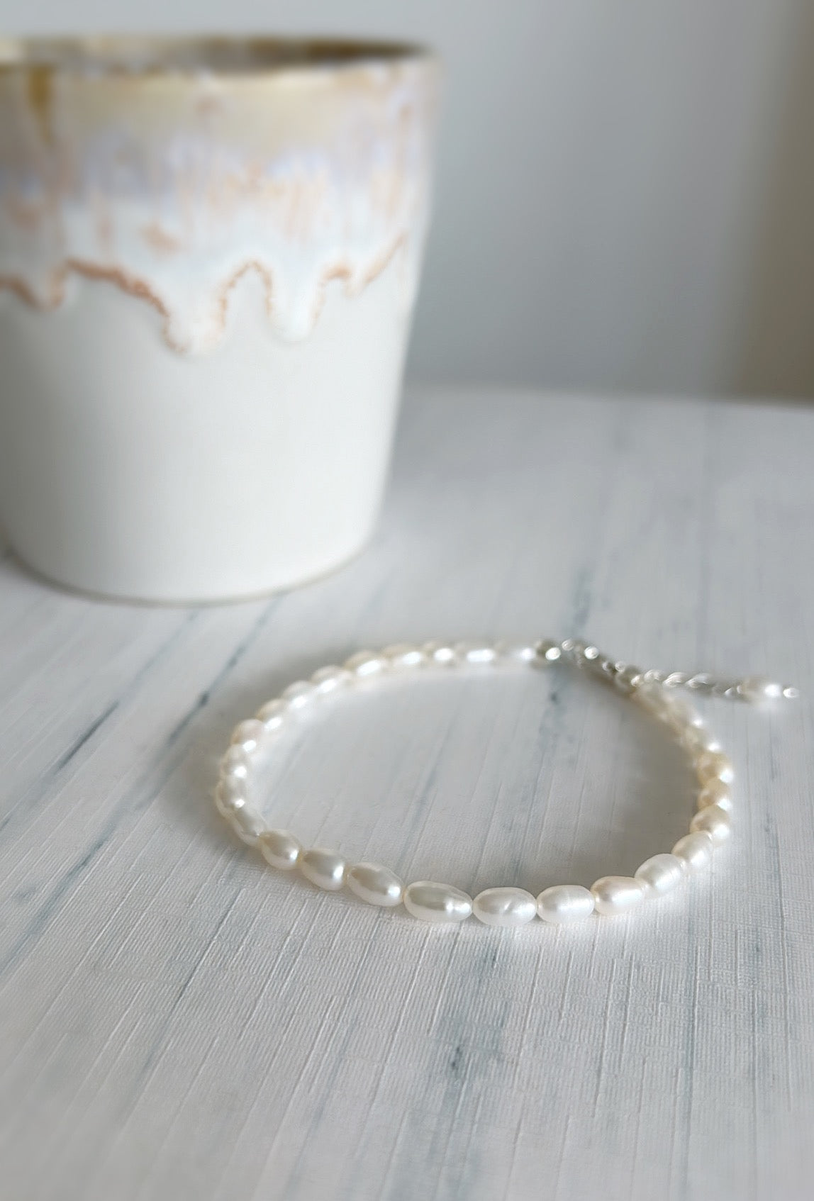 A freshwater pearl bracelet with a silver or gold filled lobster clasp and delicate extension chain