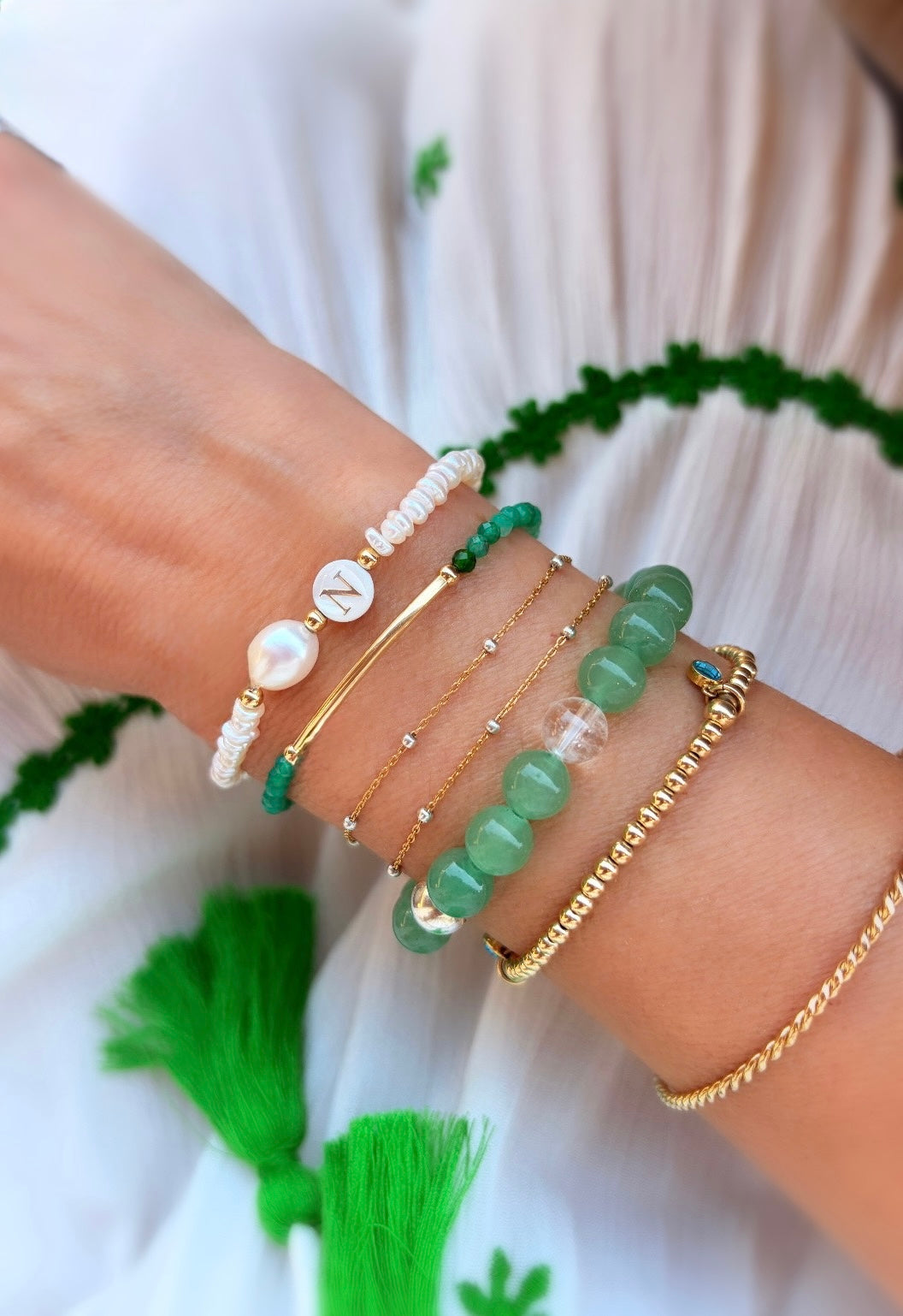 Beautiful Green Aventurine semi precious faceted bead bracelet hand threaded on a strong stretch elastic cord. This delicate bracelet comes in a choice of two finishes using either Sterling Silver or Gold Filled accents.