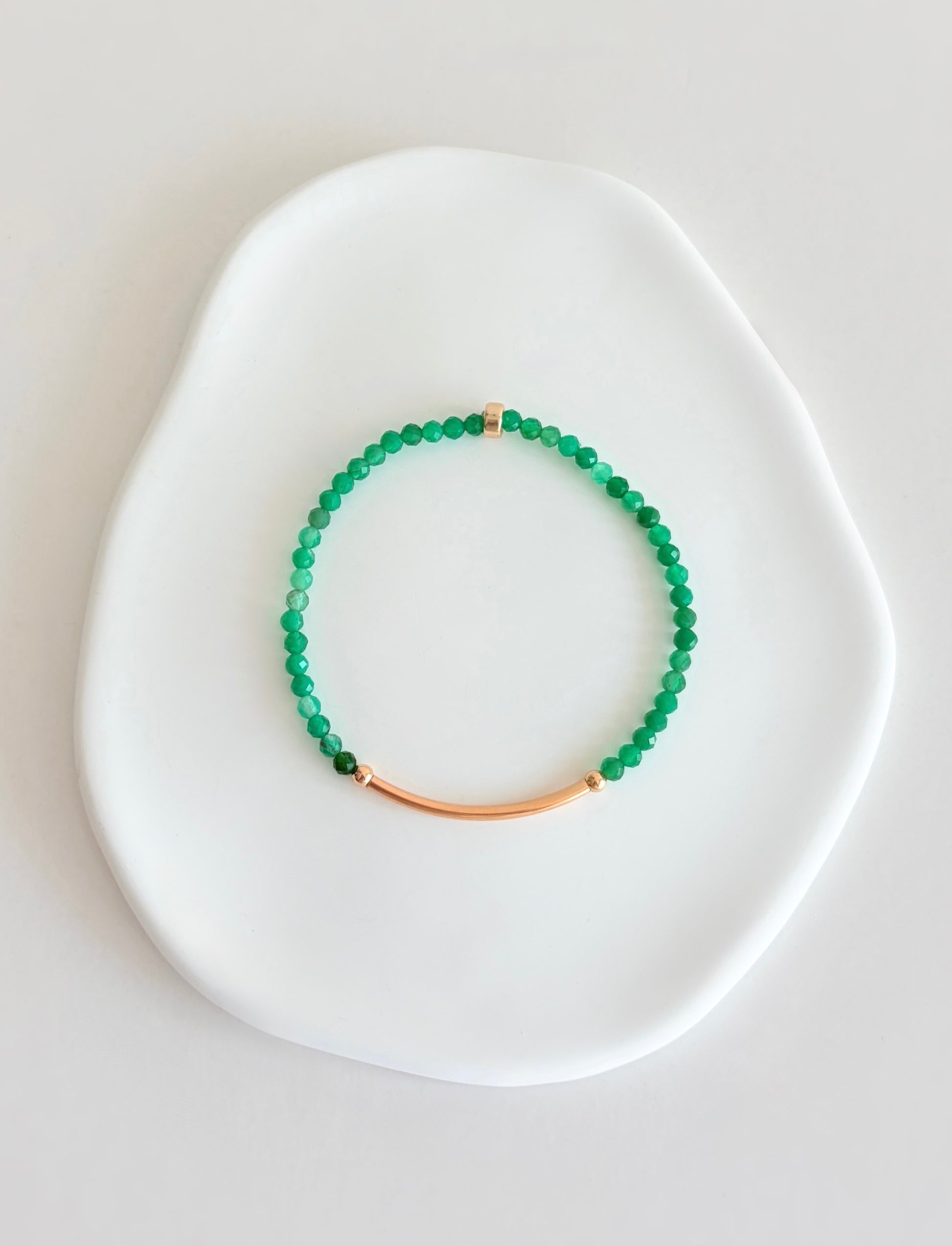 Beautiful Green Aventurine semi precious faceted bead bracelet hand threaded on a strong stretch elastic cord. This delicate bracelet comes in a choice of two finishes using either Sterling Silver or Gold Filled accents.