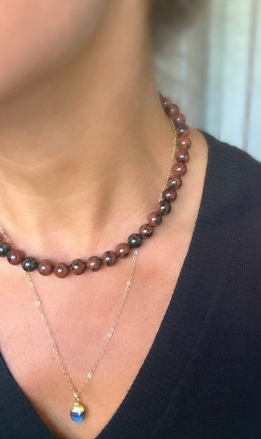 Mahogany obsidian necklace finished with a paper link chain extension with a dangle bead,  and a lobster clasp fastener in either a Gold filled or Sterling Silver finish.