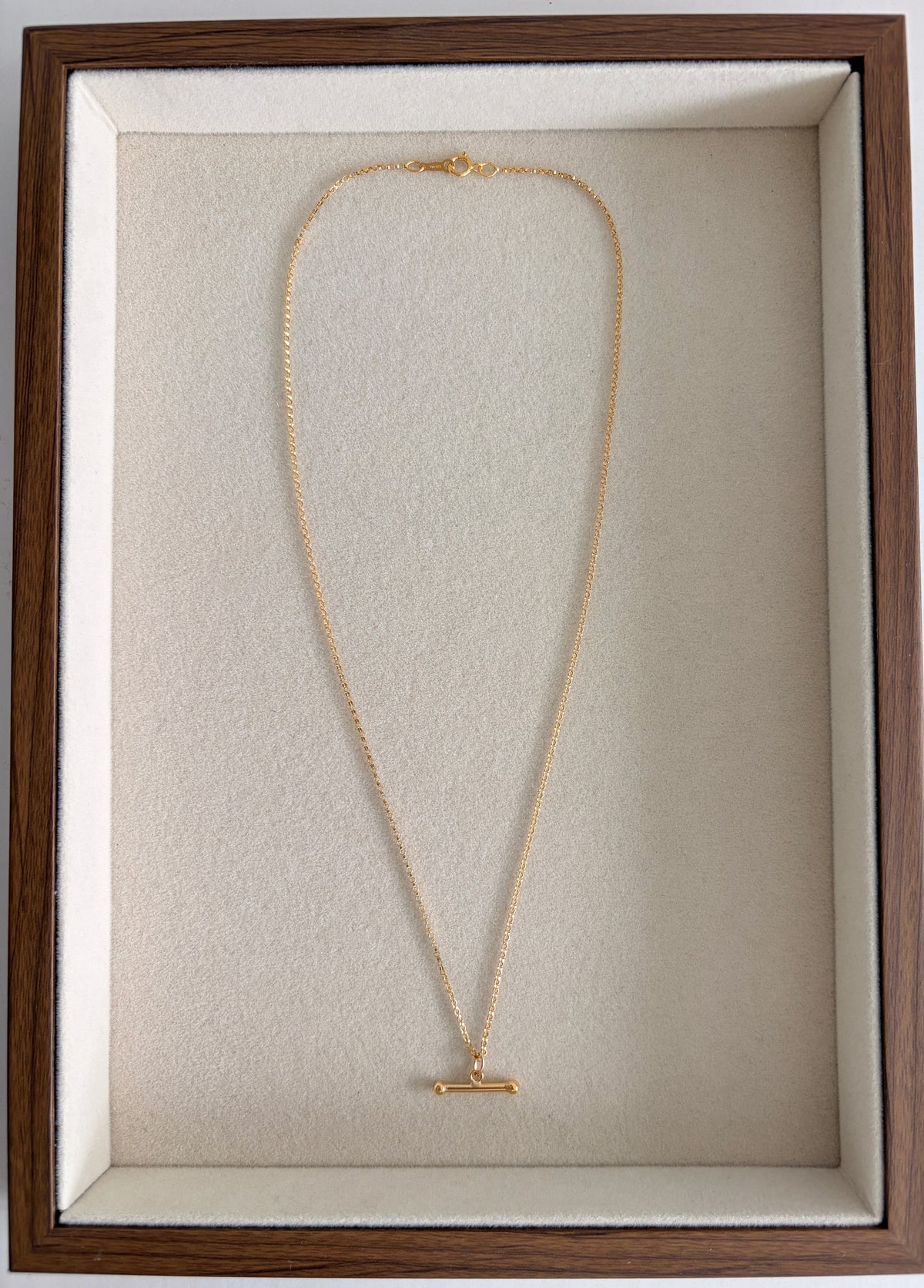 This gorgeous T-Bar necklace is the perfect everyday staple. Featuring a classic T-bar pendant on a delicate belcher/rolo chain, it’s available in your choice of Sterling Silver or Gold Filled.