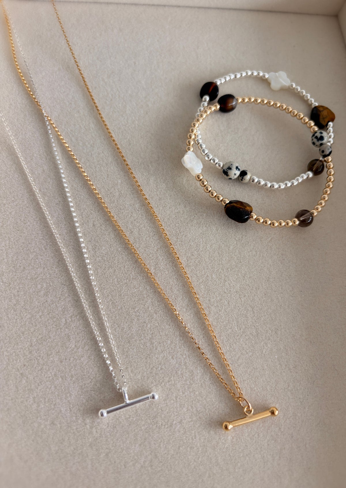 This gorgeous T-Bar necklace is the perfect everyday staple. Featuring a classic T-bar pendant on a delicate belcher/rolo chain, it’s available in your choice of Sterling Silver or Gold Filled.