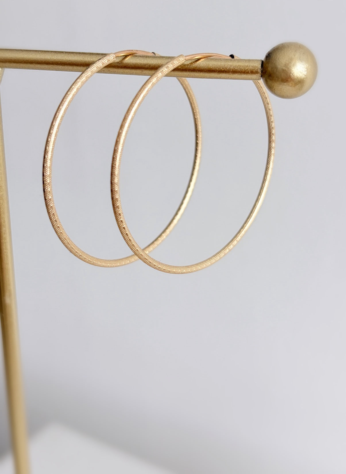 Large gold hoop earrings