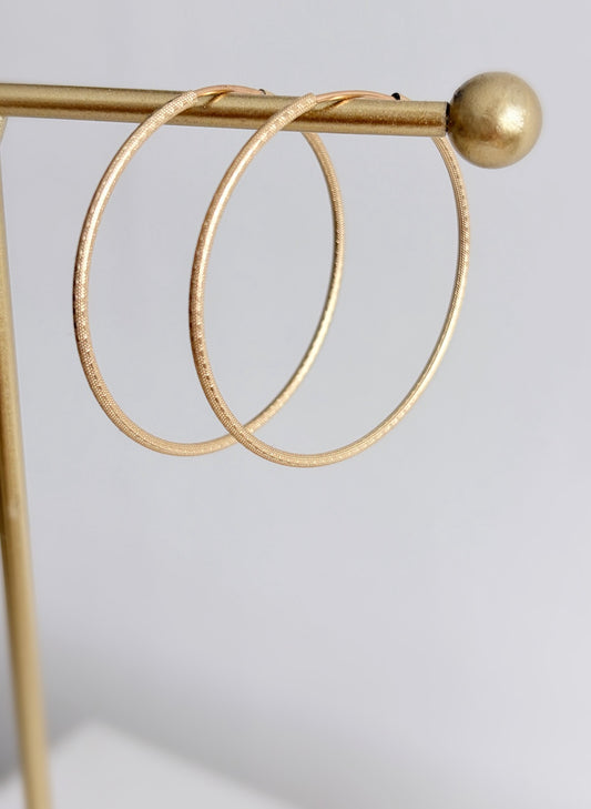 Large gold hoop earrings