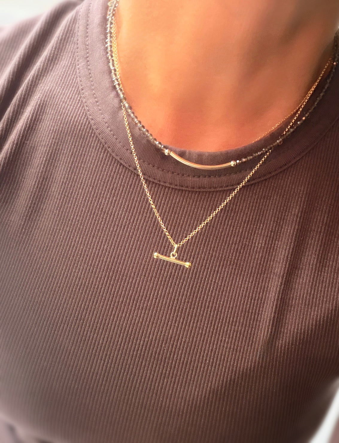 This gorgeous T-Bar necklace is the perfect everyday staple. Featuring a classic T-bar pendant on a delicate belcher/rolo chain, it’s available in your choice of Sterling Silver or Gold Filled.