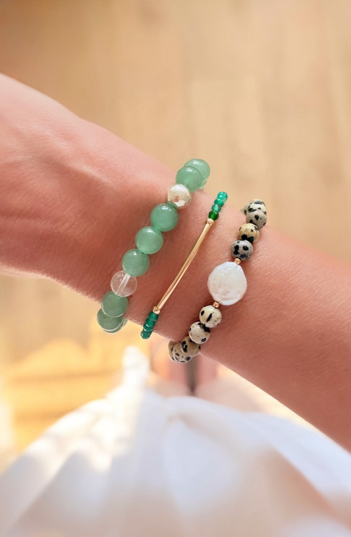 Beautiful Green Aventurine semi precious faceted bead bracelet hand threaded on a strong stretch elastic cord. This delicate bracelet comes in a choice of two finishes using either Sterling Silver or Gold Filled accents.