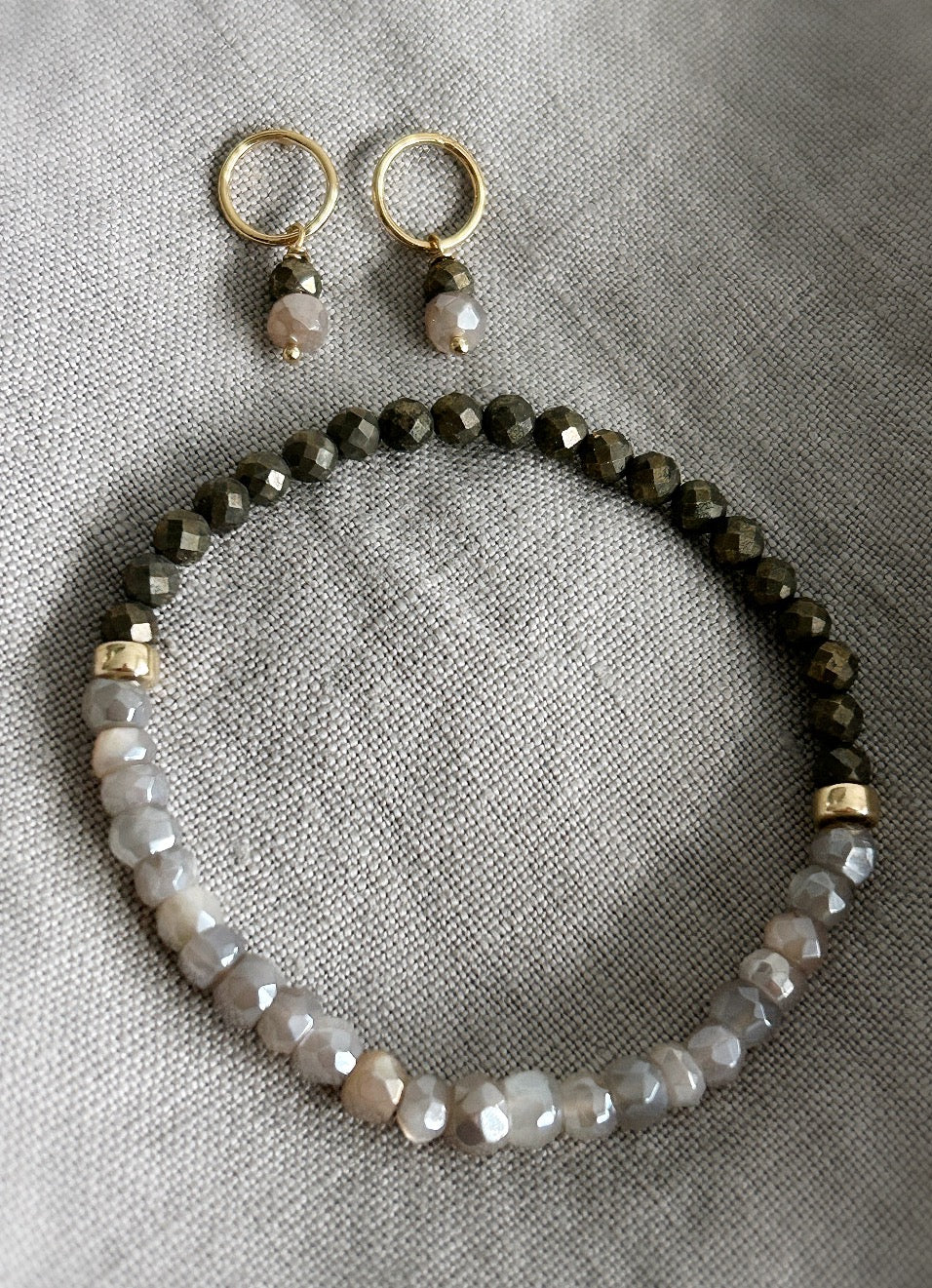 Grey moonstone & pyrite crystal gemstone earrings on a open circle stud earring 