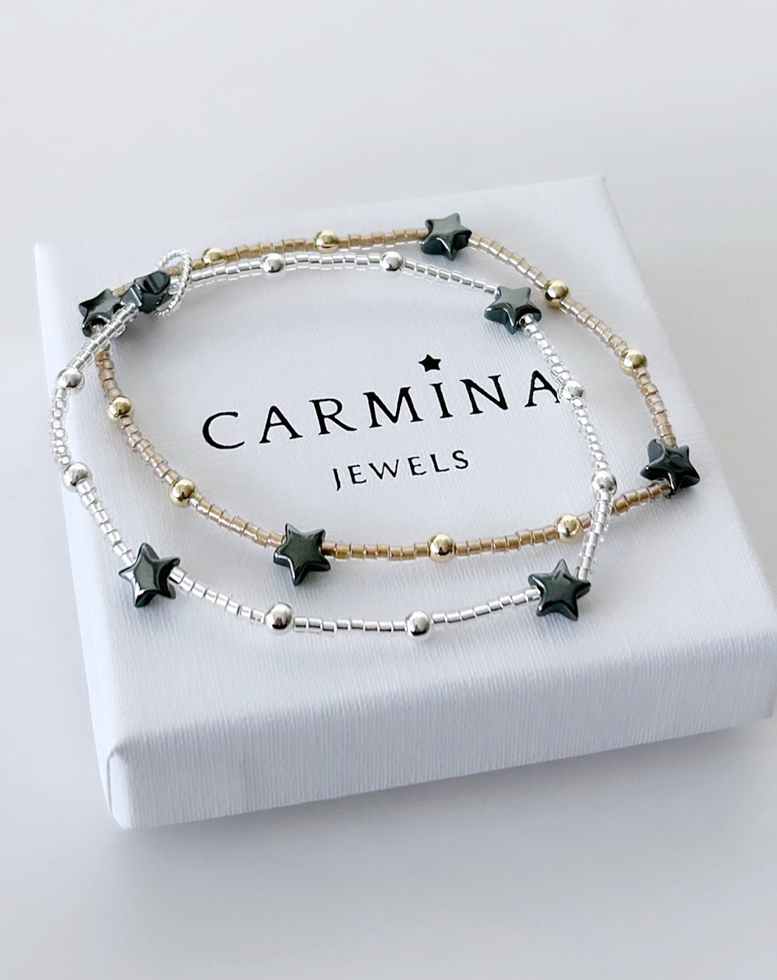 Pretty, delicate stacking bracelets with a mix of Sterling silver/Gold filled, glass Miyuki, and Hematite beads.