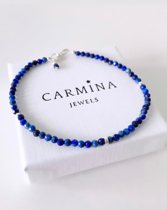 A Lapis Lazuli crystal bracelet with a silver clasp