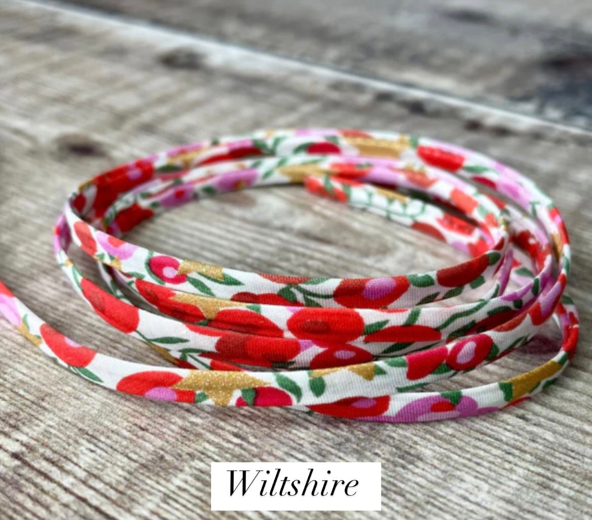Liberty of London fabric wrap bracelets, with a Sterling Silver textured slide bead.