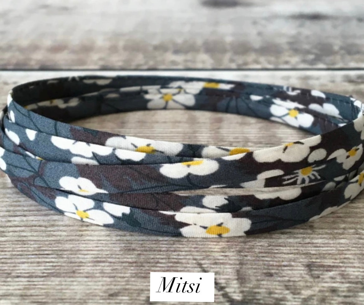 Liberty of London fabric wrap bracelets, with a Sterling Silver textured slide bead.