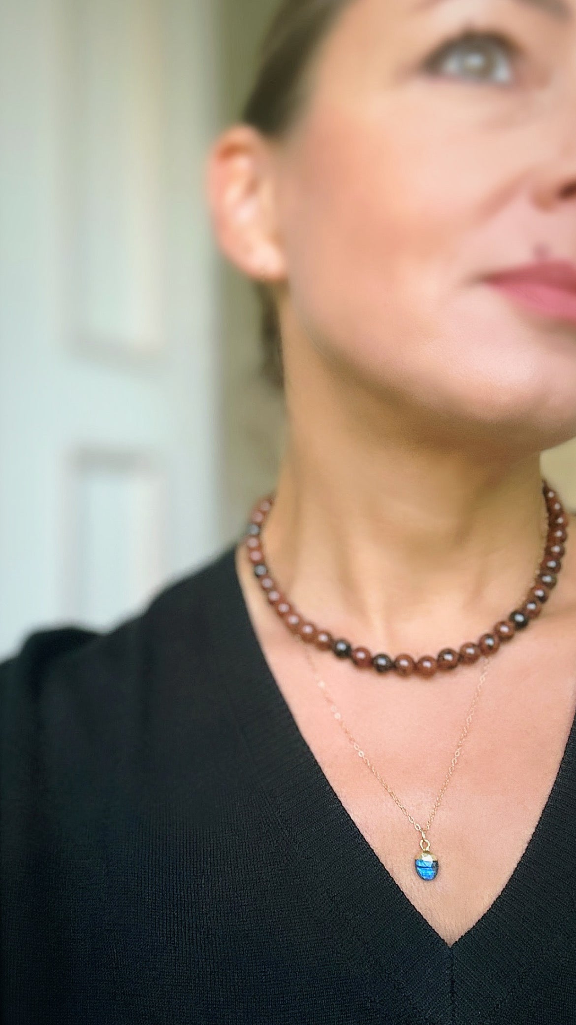 The necklace is finished with a paper link chain extension with a dangle bead,  and a lobster clasp fastener in either a Gold filled or Sterling Silver finish. The necklace length is extendable from 15.5”-17”. 
