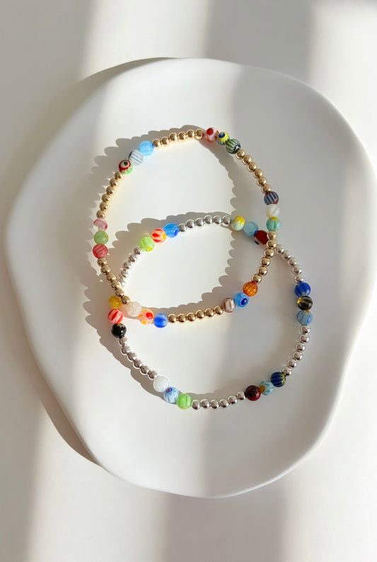 A perfect Summer stacking bracelet in either Silver or Gold. Featuring handcrafted glass beads in a mix of beautiful colours and designs.
