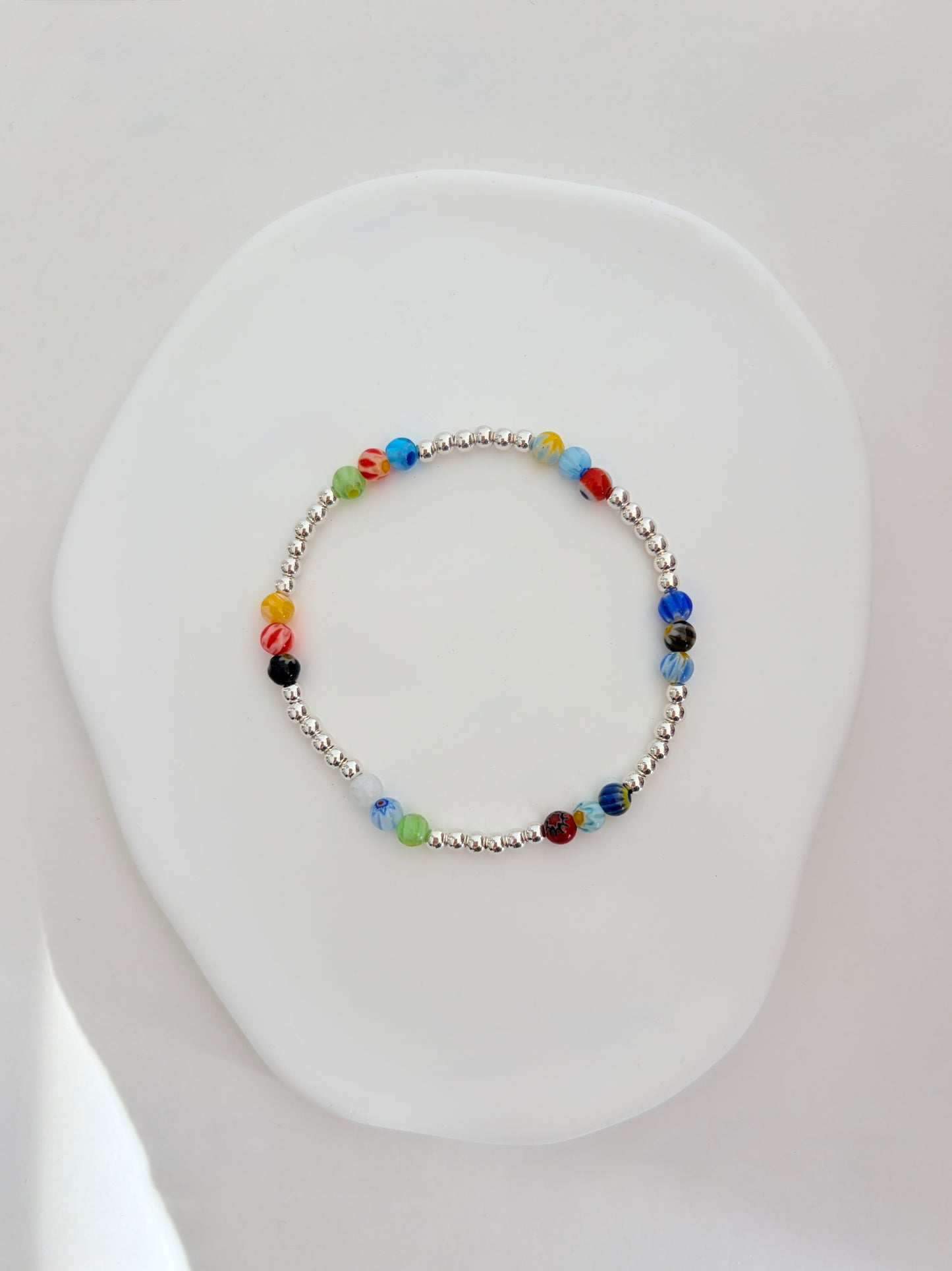 A perfect Summer stacking bracelet in either Silver or Gold. Featuring handcrafted glass beads in a mix of beautiful colours and designs.
