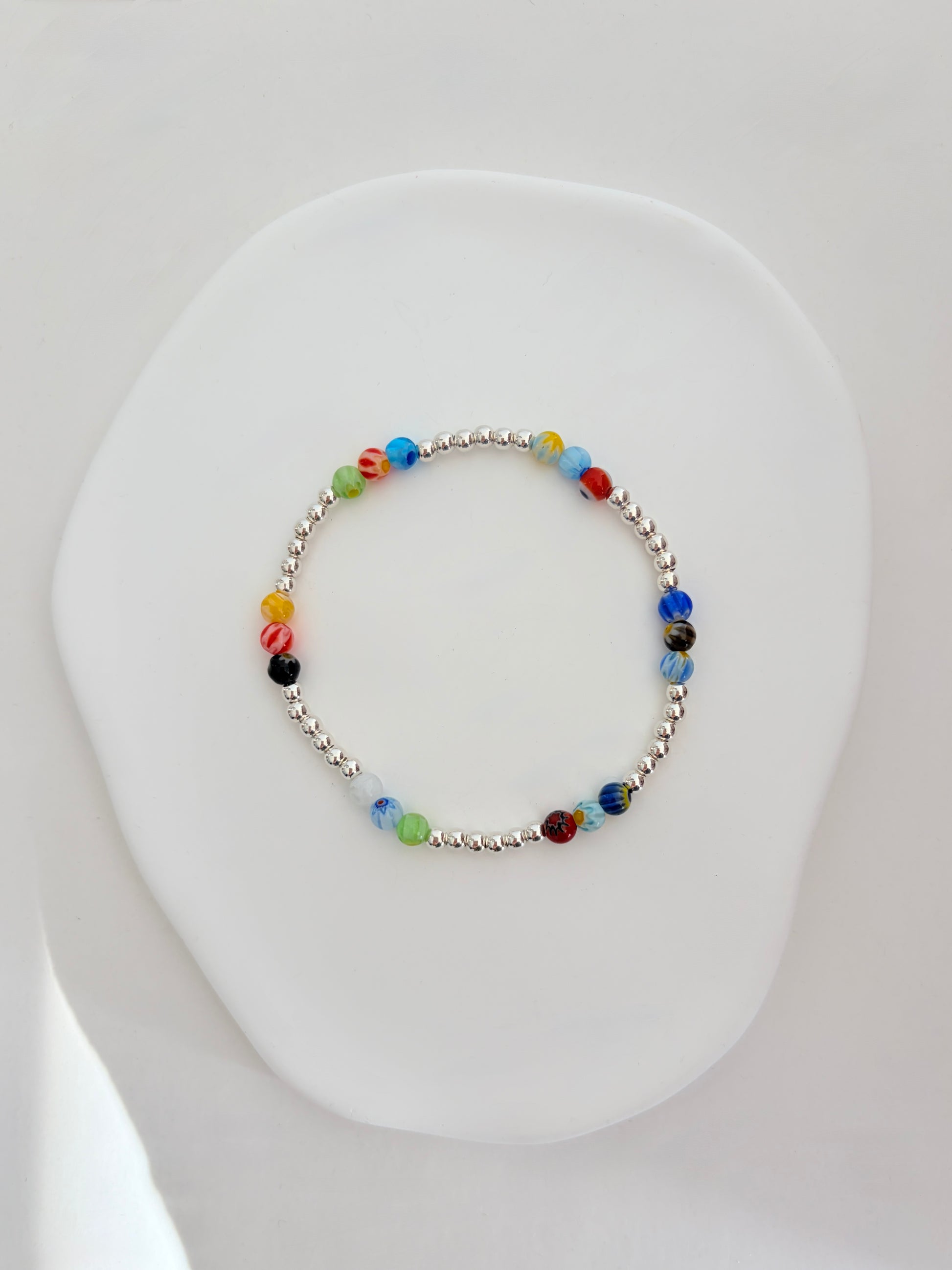 A perfect Summer stacking bracelet in either Silver or Gold. Featuring handcrafted glass beads in a mix of beautiful colours and designs.

