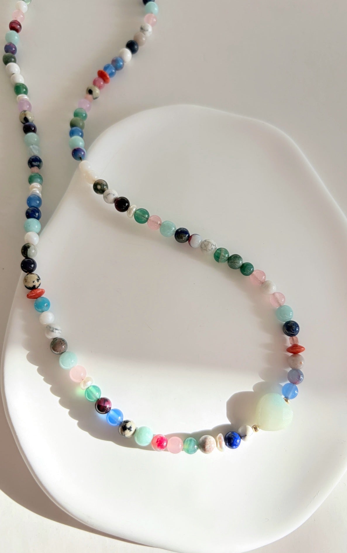 This delicious ‘Sweetie’ necklace features Semi precious beads in a glorious mix of colours, with a choice of a central Amazonite heart bead or baroque Freshwater Pearl 