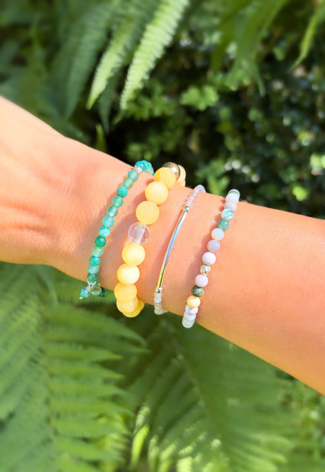 A beautiful semi precious beaded Ocean Jasper stacking bracelet accented with a Sterling Silver twist engraved bead and a Jasper dangle bead, hand threaded on a durable stretch cord.