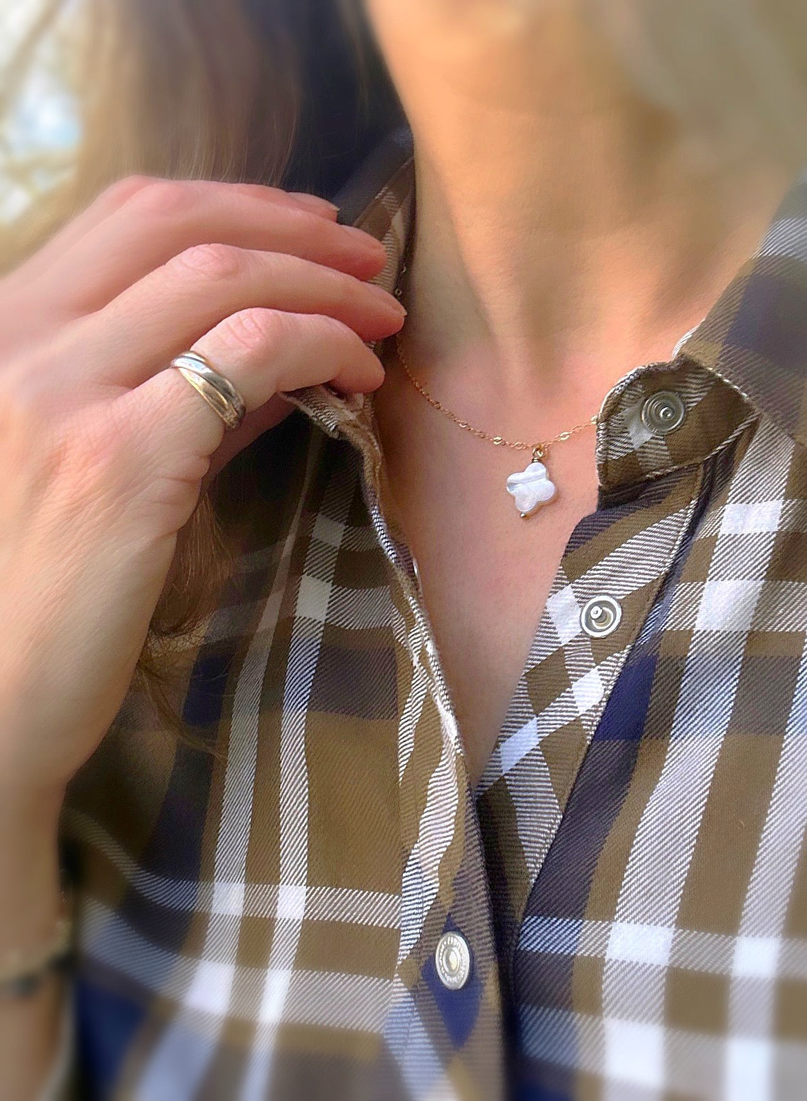 Beautiful Mother of Pearl clover shaped pendant - on a delicate 16” cable chain in either Sterling Silver or Gold Filled.
