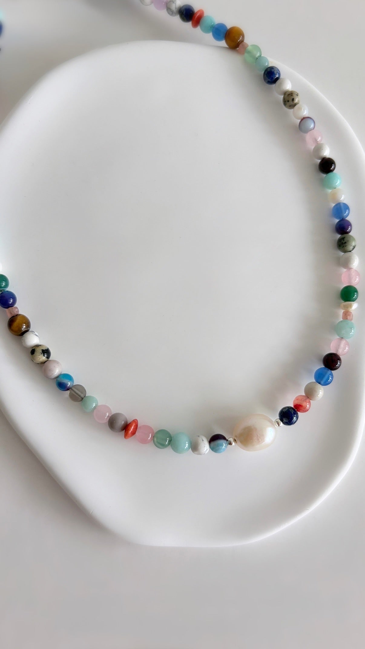 This delicious ‘Dolci’ necklace features Semi precious beads in a glorious mix of colours, with a choice of a central Amazonite heart bead or baroque Freshwater Pearl 