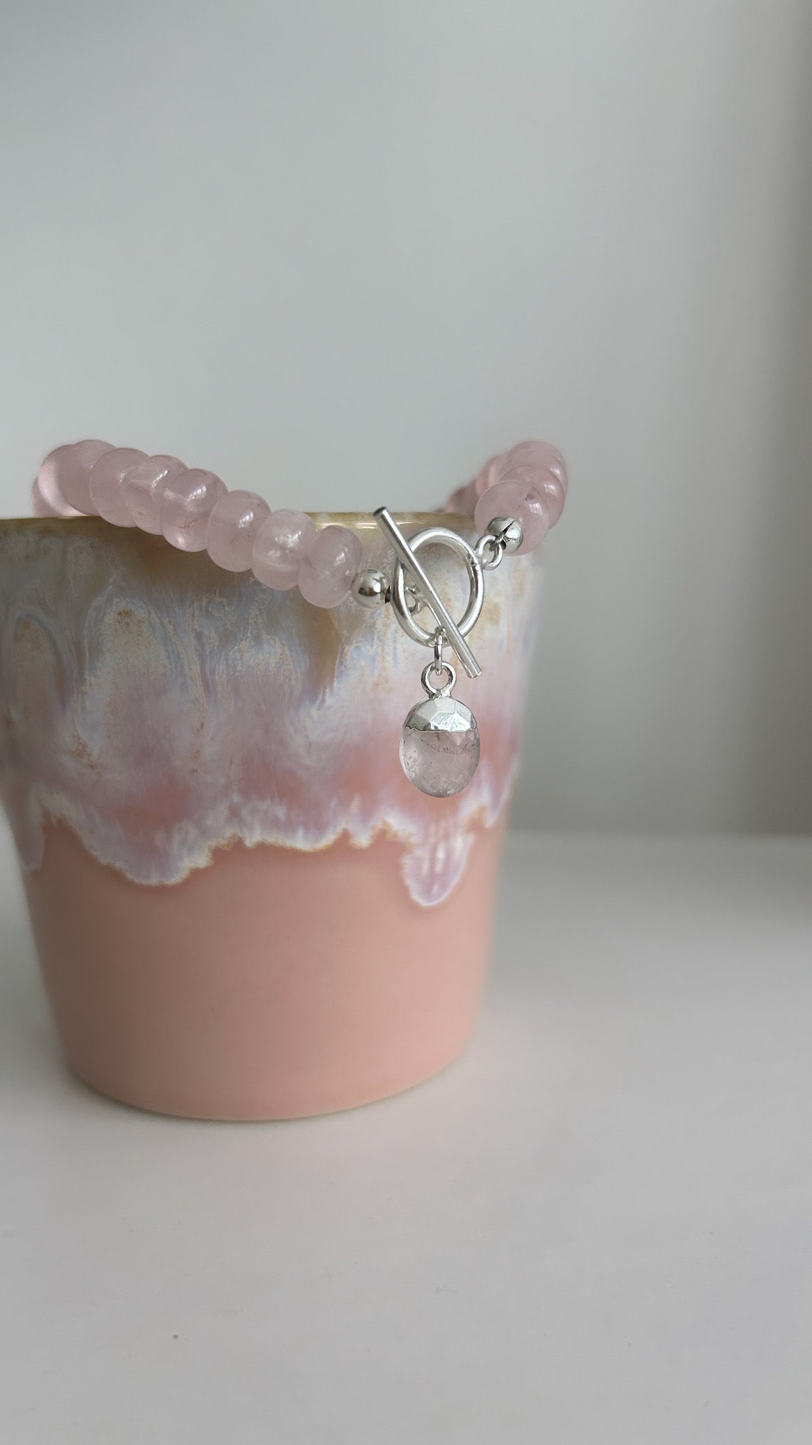 Rose Quartz bracelet with a silver toggle clap and rose quartz gemstone charm 