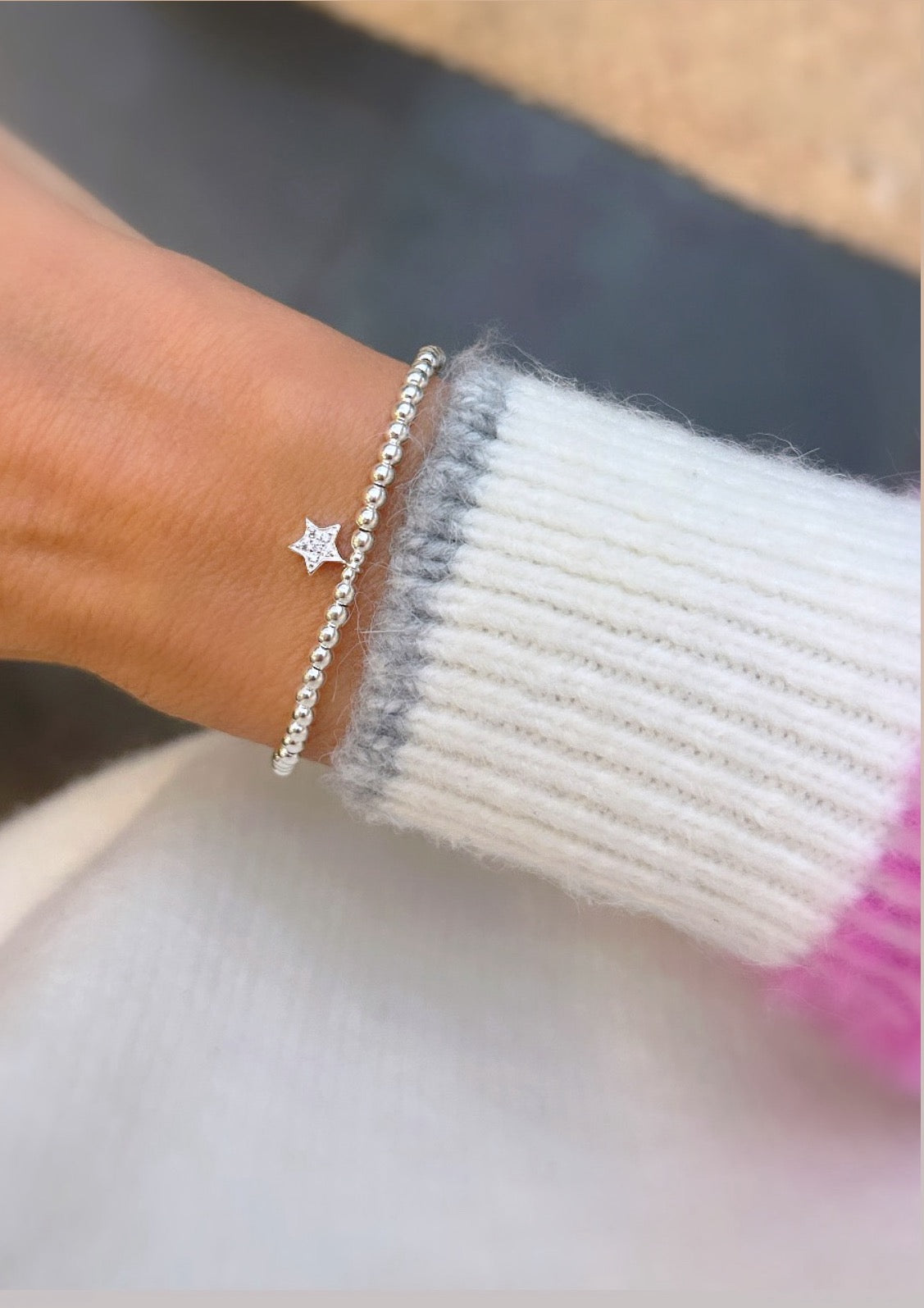 Sterling Silver CZ Star charm bracelet. This beautiful bracelet has a Sterling Silver star shaped charm, embossed with Cubic Zirconia. A perfect stacker! 