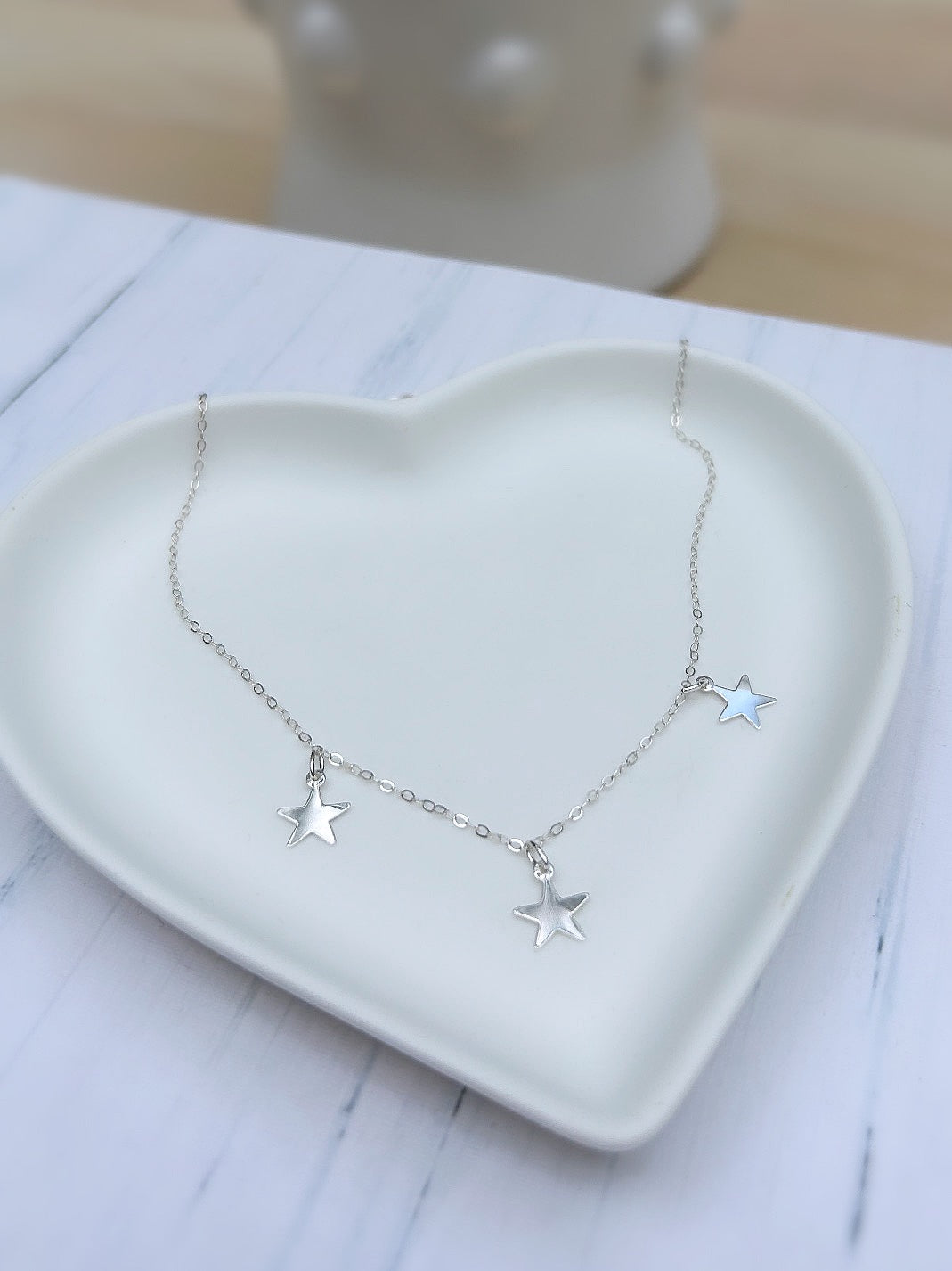 Starlight’ Sterling Silver necklace with 3 delicate Silver star charms. A perfect layering necklace.