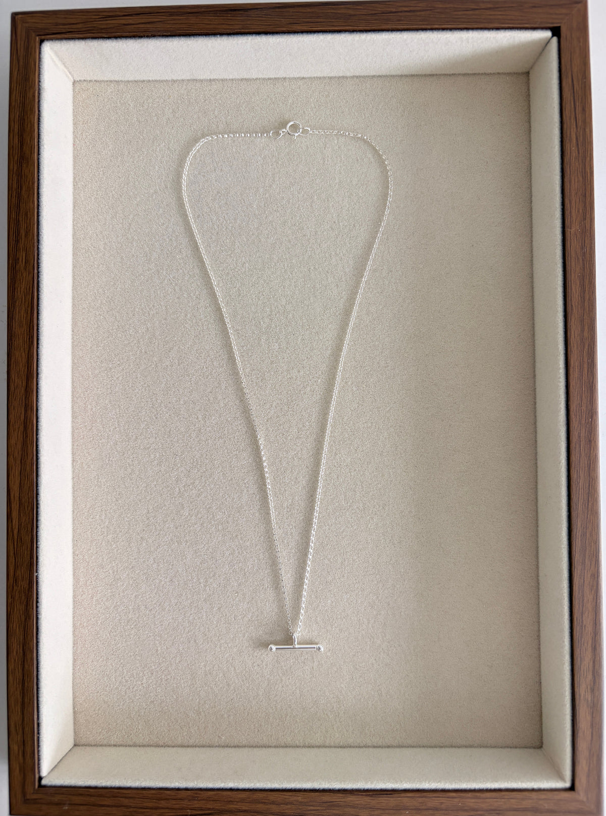 This gorgeous T-Bar necklace is the perfect everyday staple. Featuring a classic T-bar pendant on a delicate belcher/rolo chain, it’s available in your choice of Sterling Silver or Gold Filled.