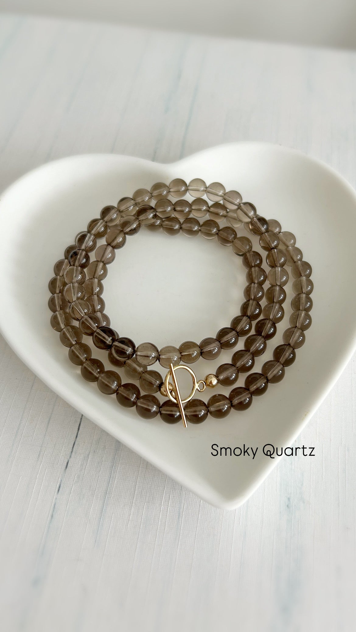 A gorgeous ‘2 in 1’ Semi Precious beaded wrap bracelet &/or necklace in a choice of either beautiful Smoky Quartz, Lapis Lazuli, Labradorite or Golden Obsidian. Finished with a delicate toggle clasp in Gold filled or Sterling Silver. 
