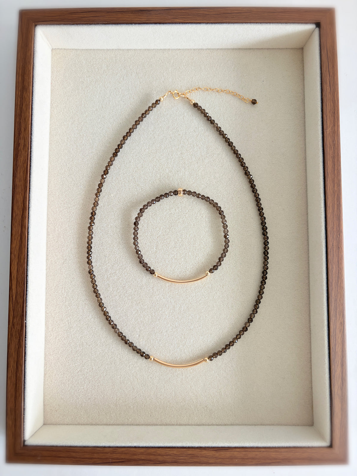 Beautiful Smoky Quartz semi precious faceted bead bracelet hand threaded on a strong stretch elastic cord. This delicate bracelet comes in a choice of two finishes using either Sterling Silver or Gold Filled accents.