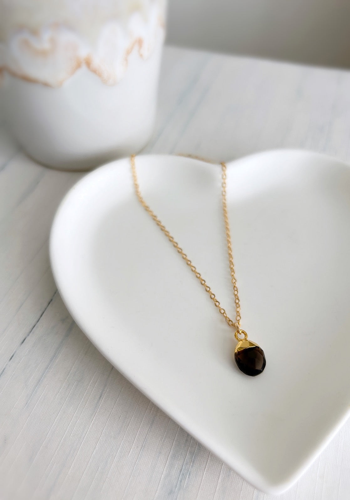 A gorgeous chocolate coloured Smoky Quartz gemstone pendant on either a Sterling Silver or Gold finish on a 16” cable chain. 