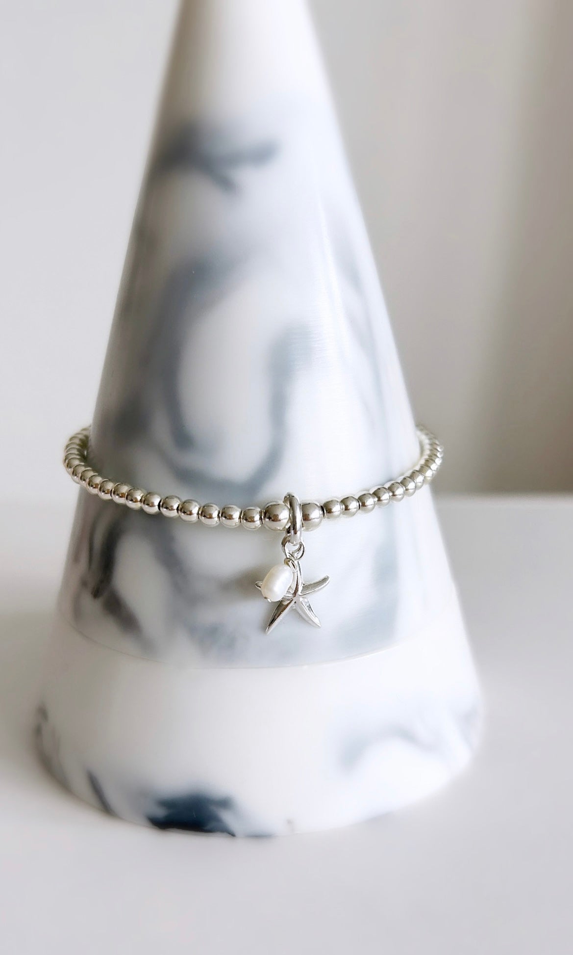Silver bracelet with a starfish charm