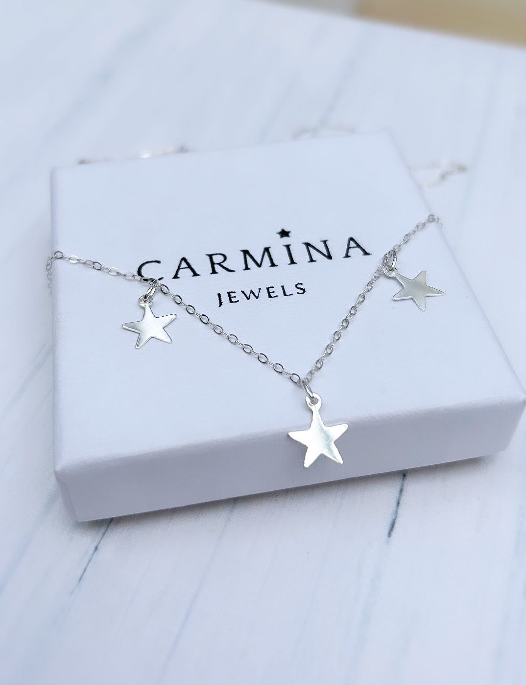 Starlight’ Sterling Silver necklace with 3 delicate Silver star charms. A perfect layering necklace.
