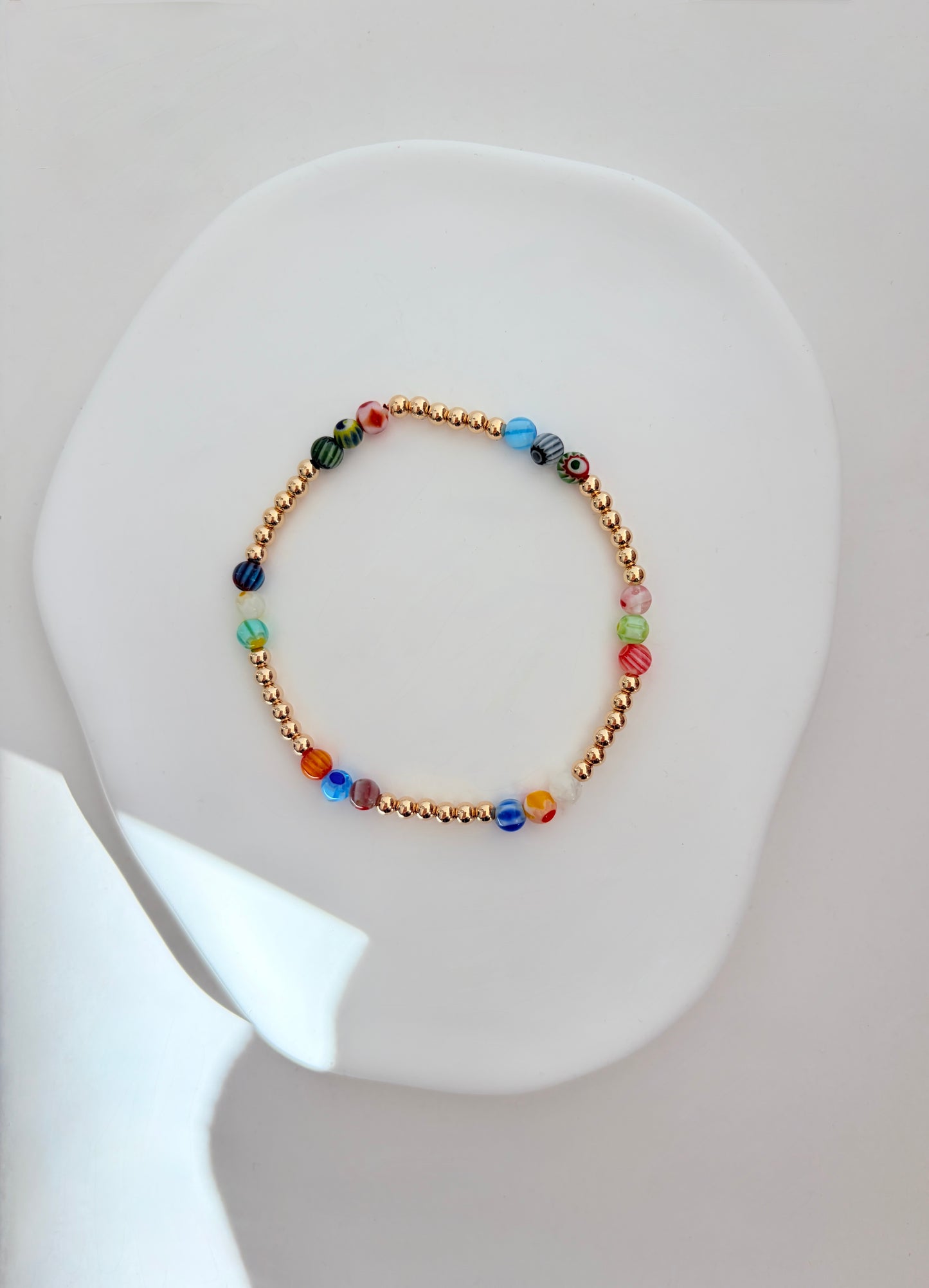 A perfect Summer stacking bracelet in either Silver or Gold. Featuring handcrafted glass beads in a mix of beautiful colours and designs.
