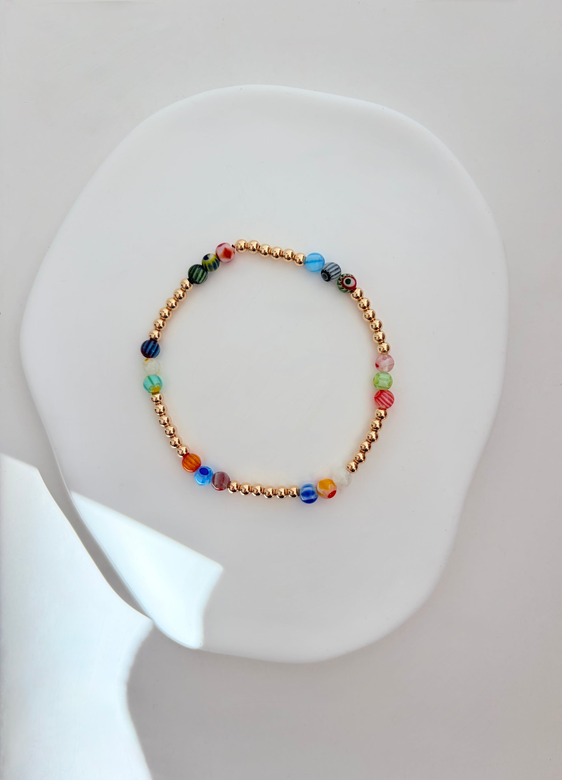 A perfect Summer stacking bracelet in either Silver or Gold. Featuring handcrafted glass beads in a mix of beautiful colours and designs.
