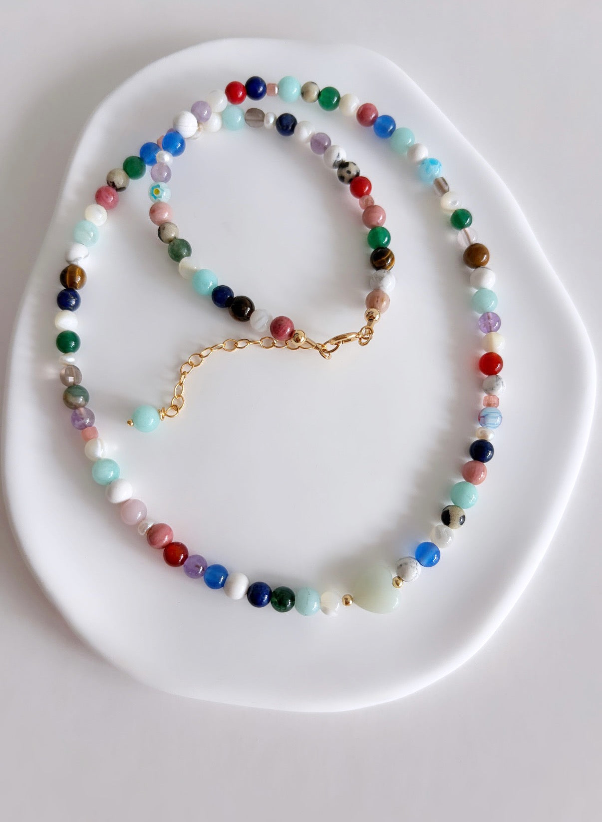 This delicious ‘Dolci’ necklace features Semi precious beads in a glorious mix of colours, with a choice of a central Amazonite heart bead or a beautiful baroque Freshwater Pearl.