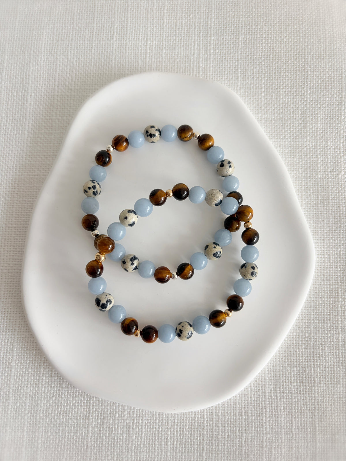 A gorgeous semi precious mixed bead bracelet incorporating Angelite, Tigers Eye and Dalmatian Jasper beads.  