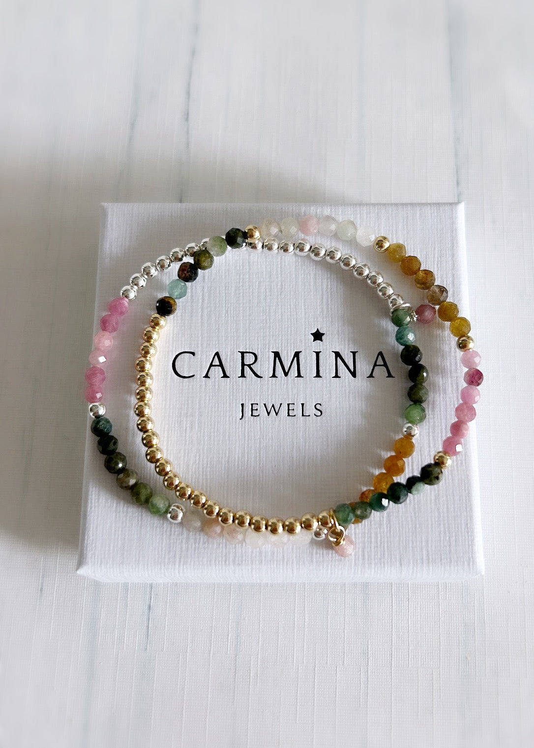 A beautiful sparkling Multi-tourmaline micro-faceted beaded bracelet in a pretty array of colours. In a Sterling Silver or Gold Filled finish, hand threaded on a jewellery stretch cord. 
