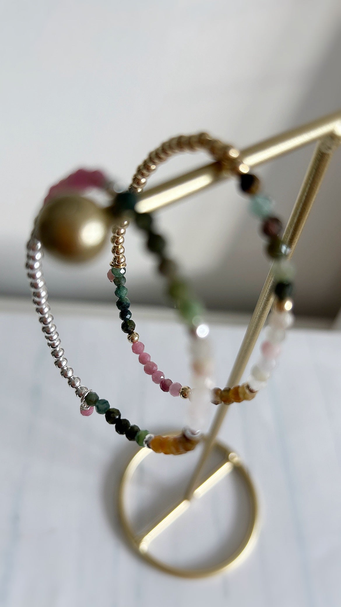 A beautiful sparkling Multi-tourmaline micro-faceted beaded bracelet in a pretty array of colours. In a Sterling Silver or Gold Filled finish, hand threaded on a jewellery stretch cord. 

